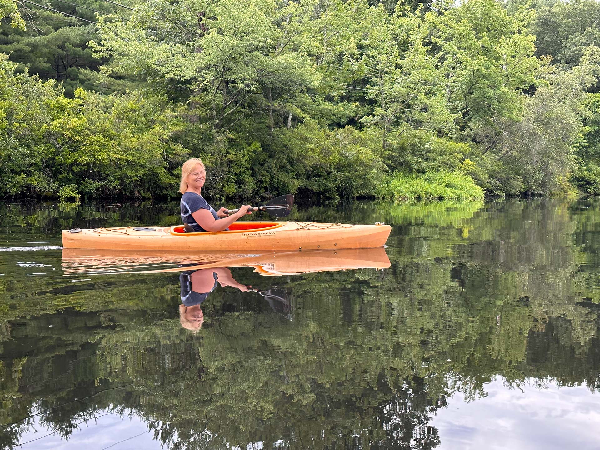 Woman In Canoe